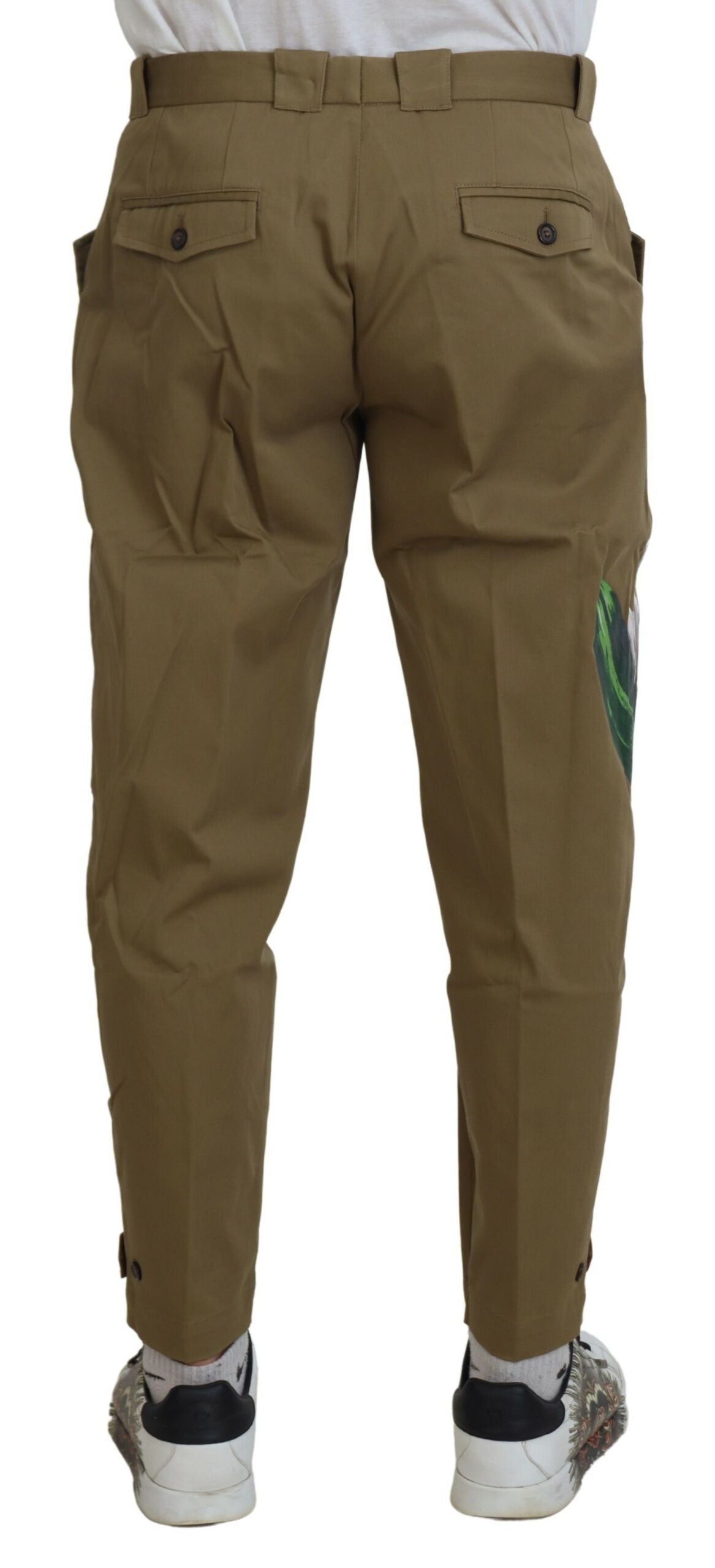 Beige cotton stretch floral chinos pants by Dolce & Gabbana, showing slim fit design and floral pattern details.