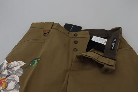 Beige cotton stretch floral chinos pants by Dolce & Gabbana, showing tailored fit and floral pattern fabric.