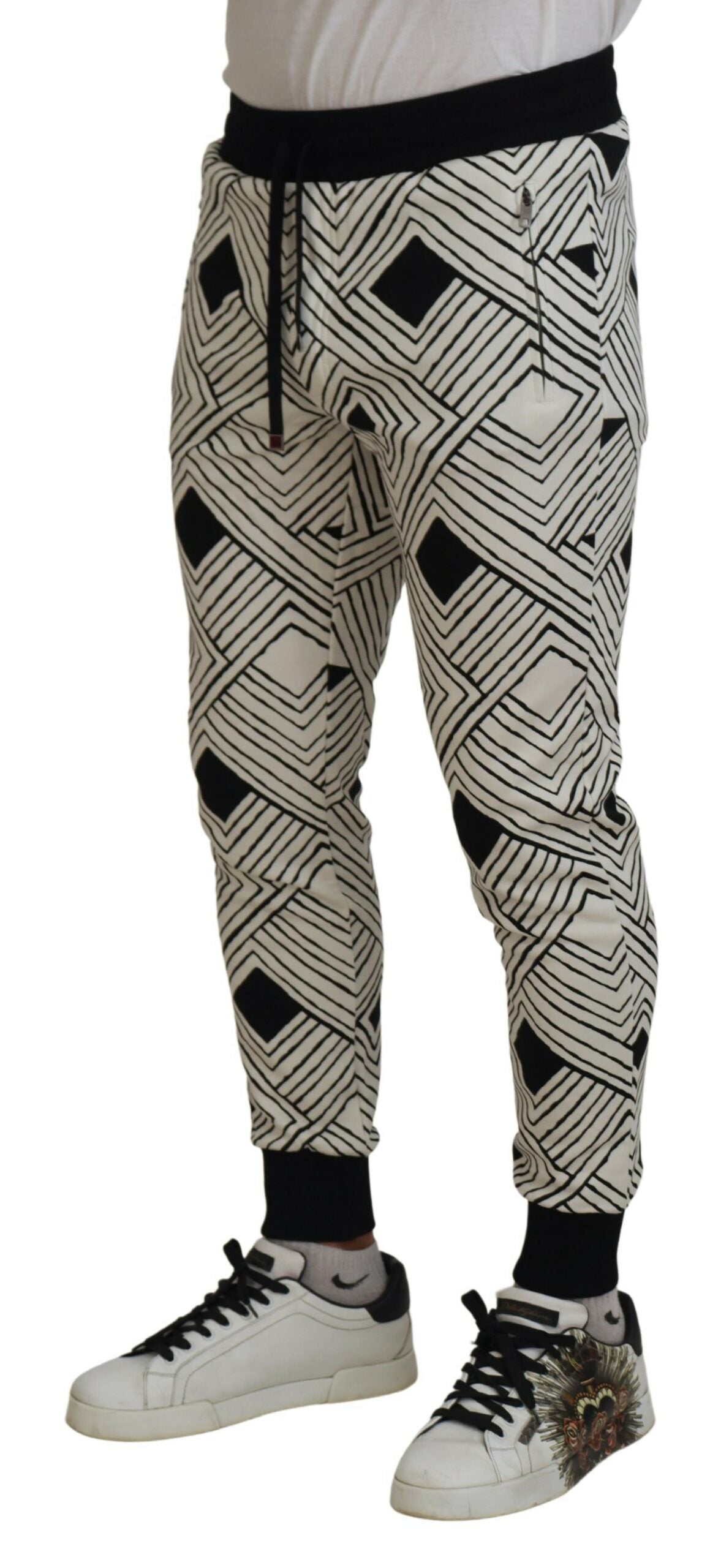 Black and white cotton sport trousers from Dolce & Gabbana, featuring a comfortable fit and athletic style.