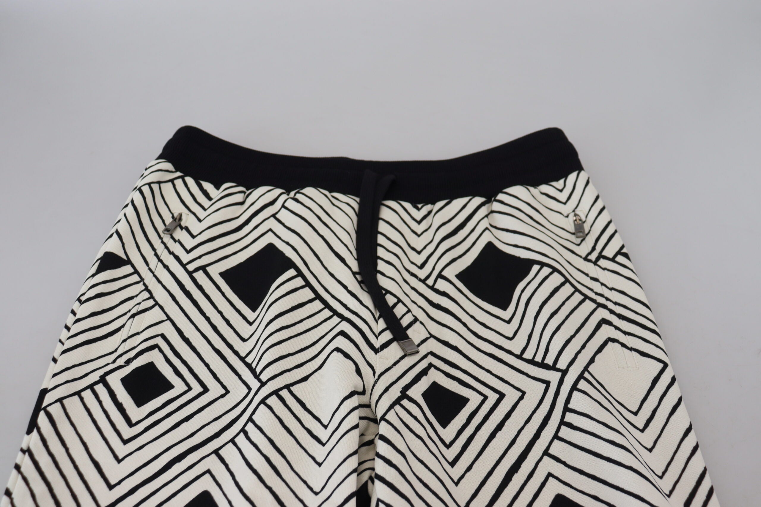 Black and white cotton sport trousers by Dolce & Gabbana, featuring a relaxed fit and athletic style.
