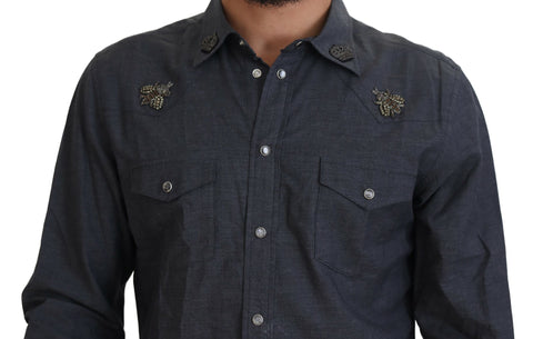 Blue cotton denim shirt with crystal bee embroidery by Dolce & Gabbana, featuring a classic collar and button-front design.