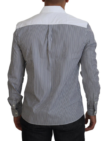 Gray and white striped slim fit shirt by Dolce & Gabbana, shown hanging on a wooden hanger.