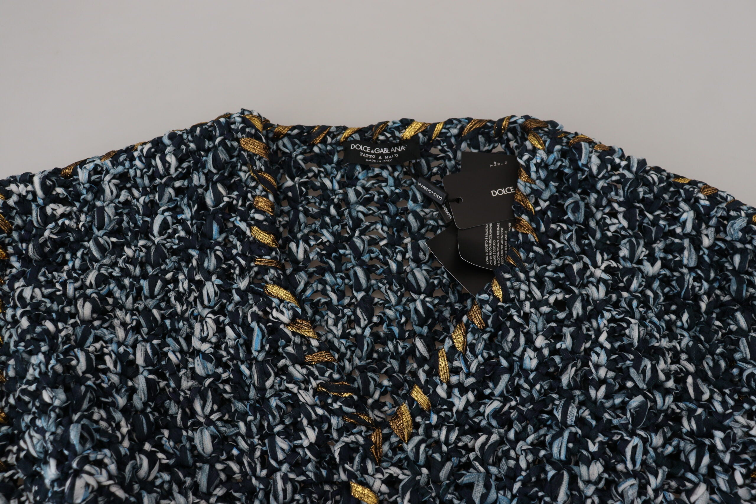 Blue button cardigan sweater by Dolce & Gabbana, featuring a classic knit design and front button closure.