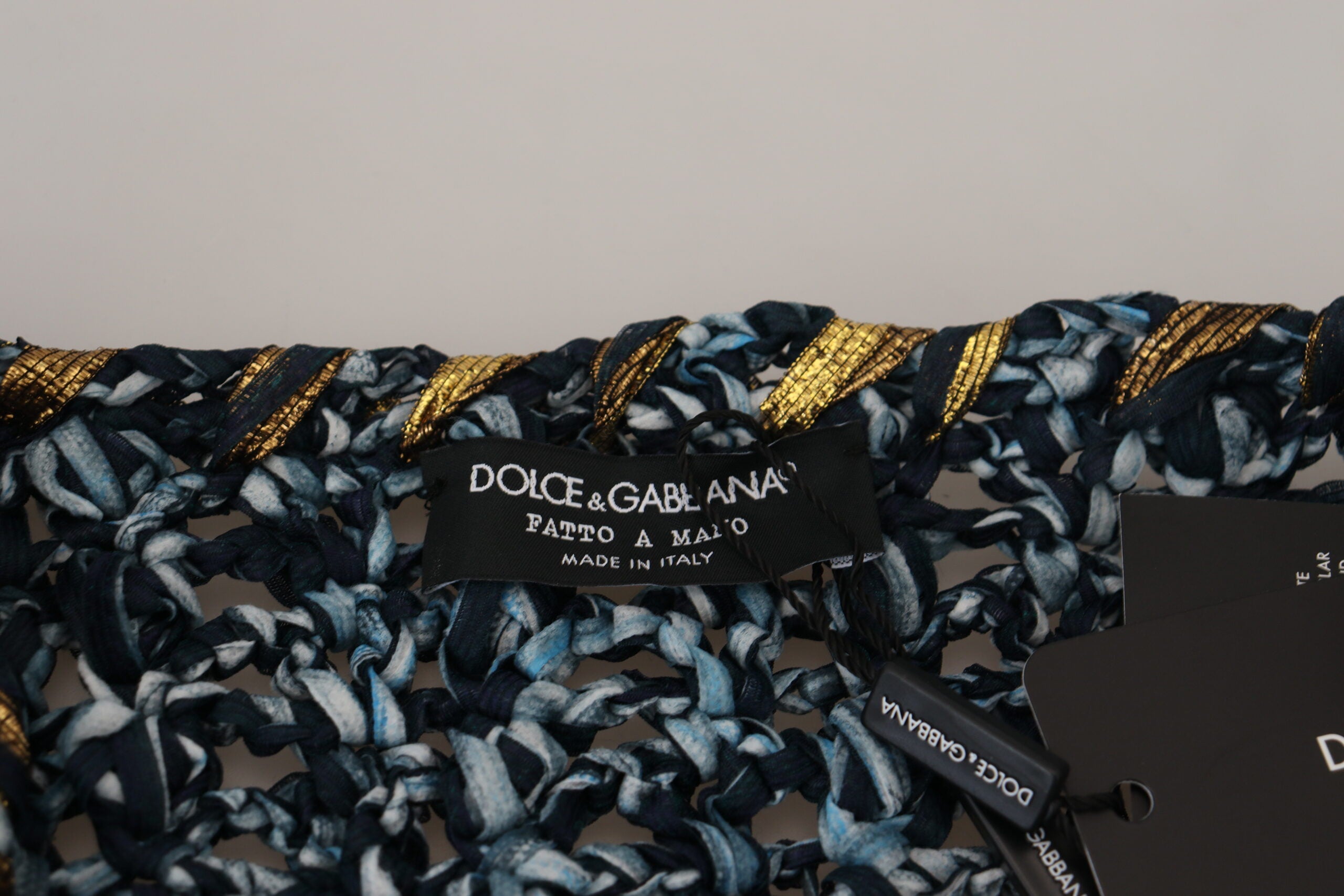 Blue Dolce & Gabbana Button Cardigan Sweater with front buttons and ribbed cuffs, styled on a model.