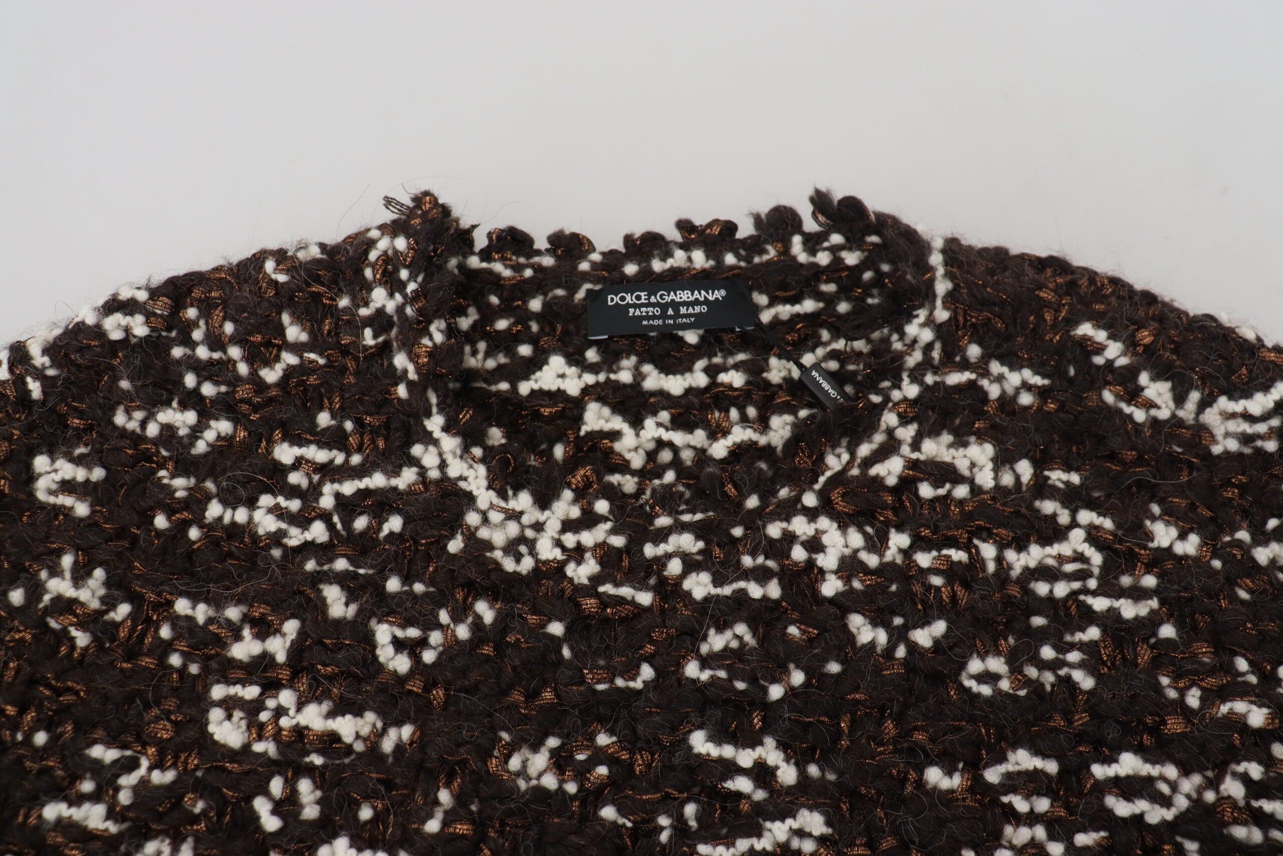 Brown knitted wool sweater by Dolce & Gabbana, featuring a cozy handmade design with ribbed cuffs and a classic fit.
