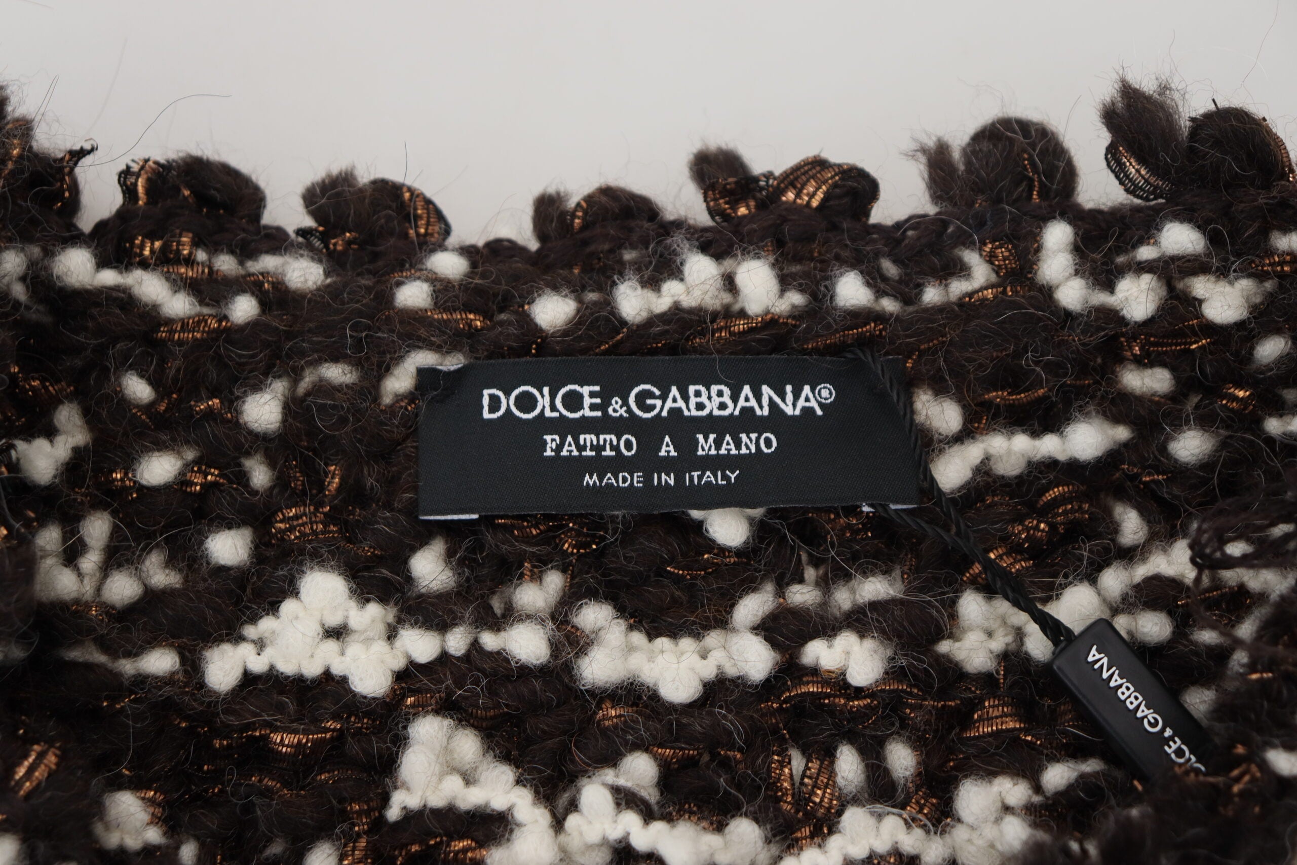Brown knitted wool sweater by Dolce & Gabbana, featuring a cozy handmade design with detailed stitching.