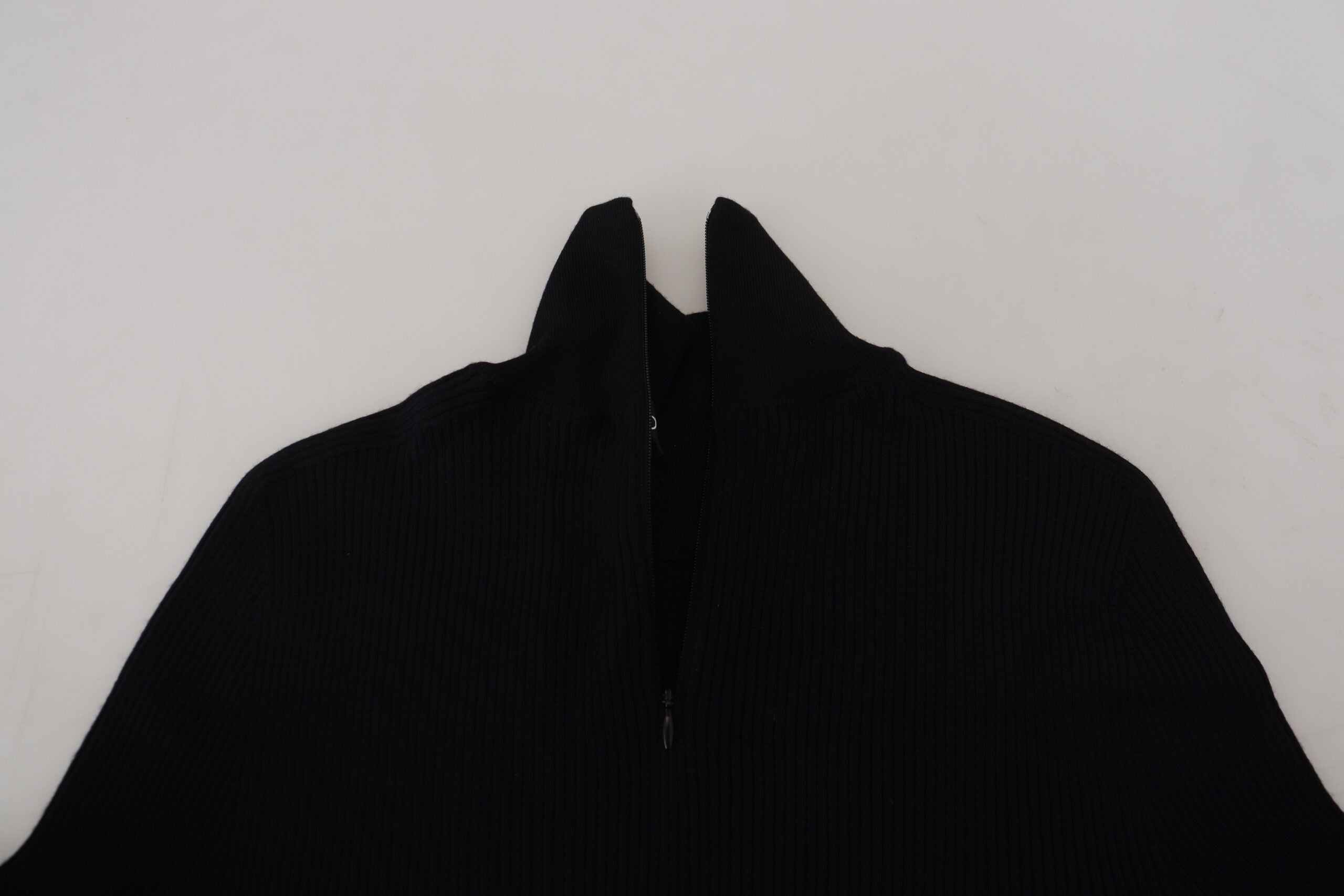 Black Dolce & Gabbana half zip turtleneck pullover sweater with ribbed cuffs and a sleek, fitted design on a plain background.