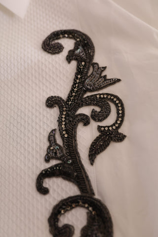White tuxedo slim fit Baroque shirt by Dolce & Gabbana, featuring intricate Baroque patterns and elegant collar details.
