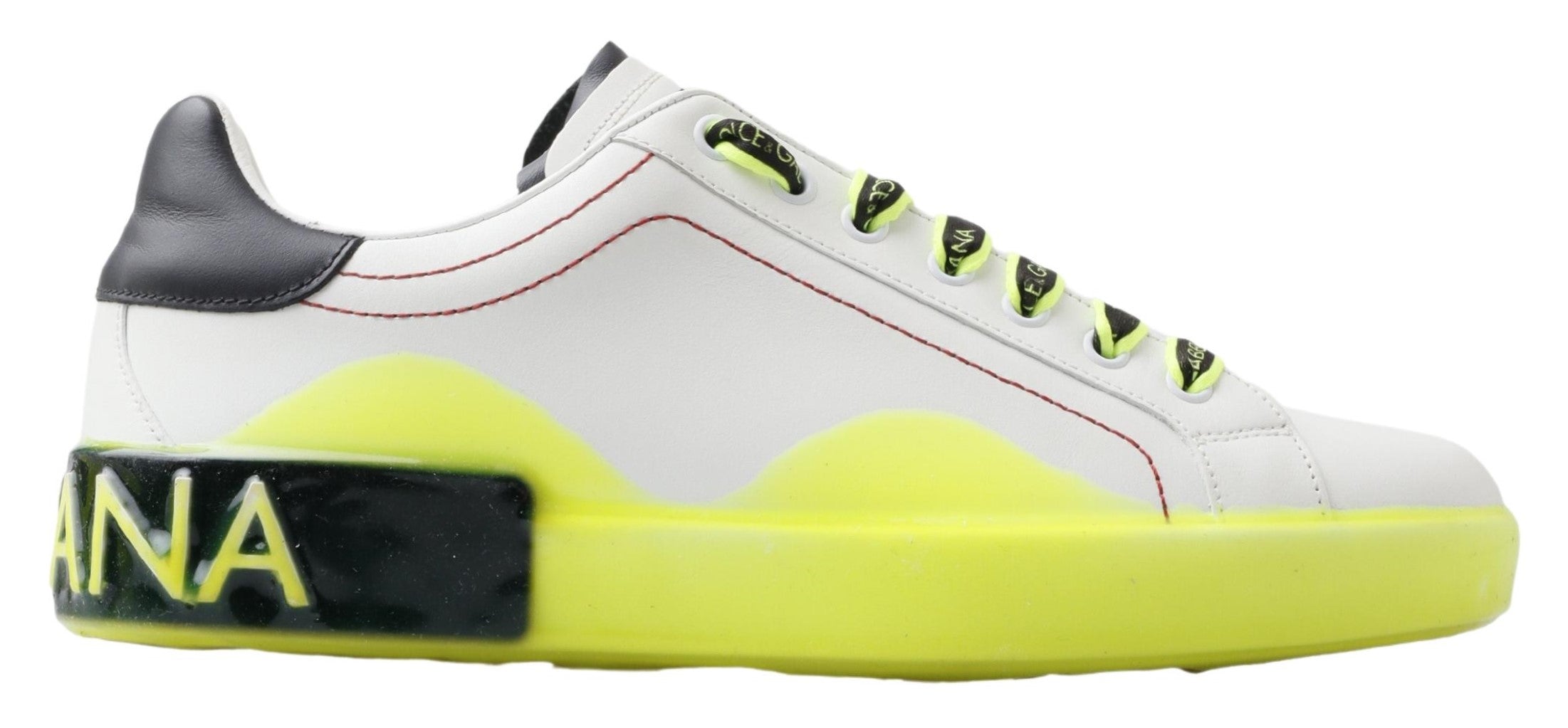 White and yellow Portofino leather sneakers by Dolce & Gabbana showcasing stylish casual footwear with a sleek design.