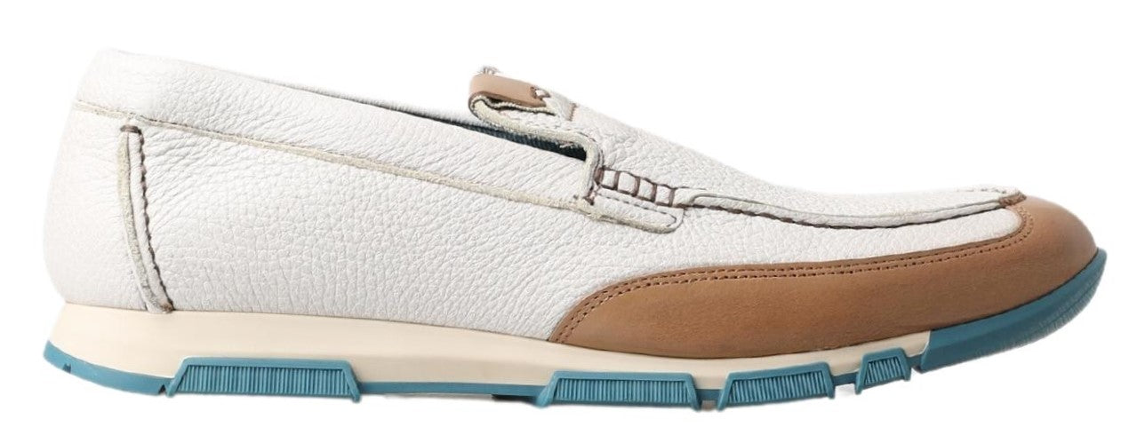 White leather loafers by Dolce & Gabbana featuring moccasin-style design and sleek stitching details.