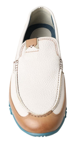 White leather loafers by Dolce & Gabbana featuring classic moccasin style and sleek design, perfect for elegant casual wear.