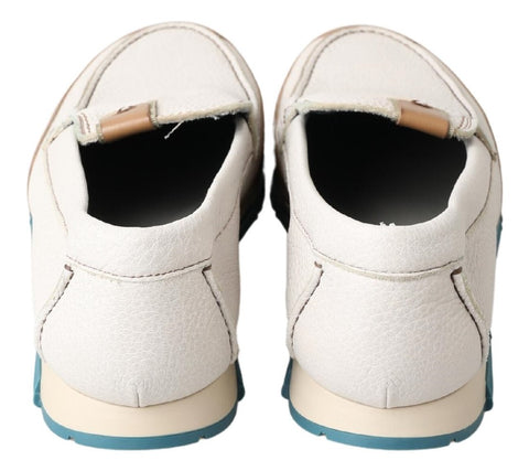 Pair of white leather loafers moccasins shoes by Dolce & Gabbana featuring sleek design and smooth leather finish.