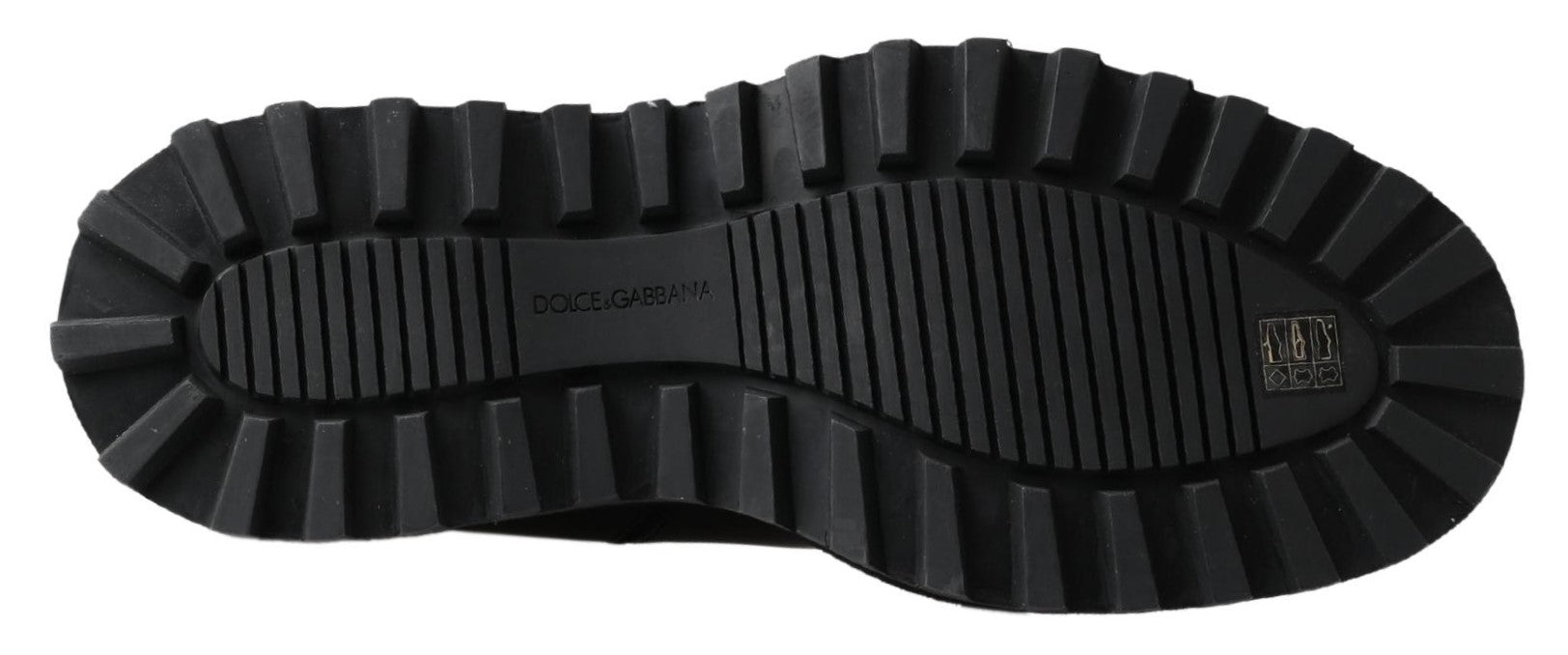 Black leather slip-on stretch boots by Dolce & Gabbana, featuring sleek design and ankle-high fit.