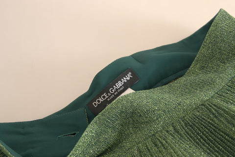 Metallic green high waist A-line pleated skirt by Dolce & Gabbana, shown in a close-up image highlighting the fabric and pleats.