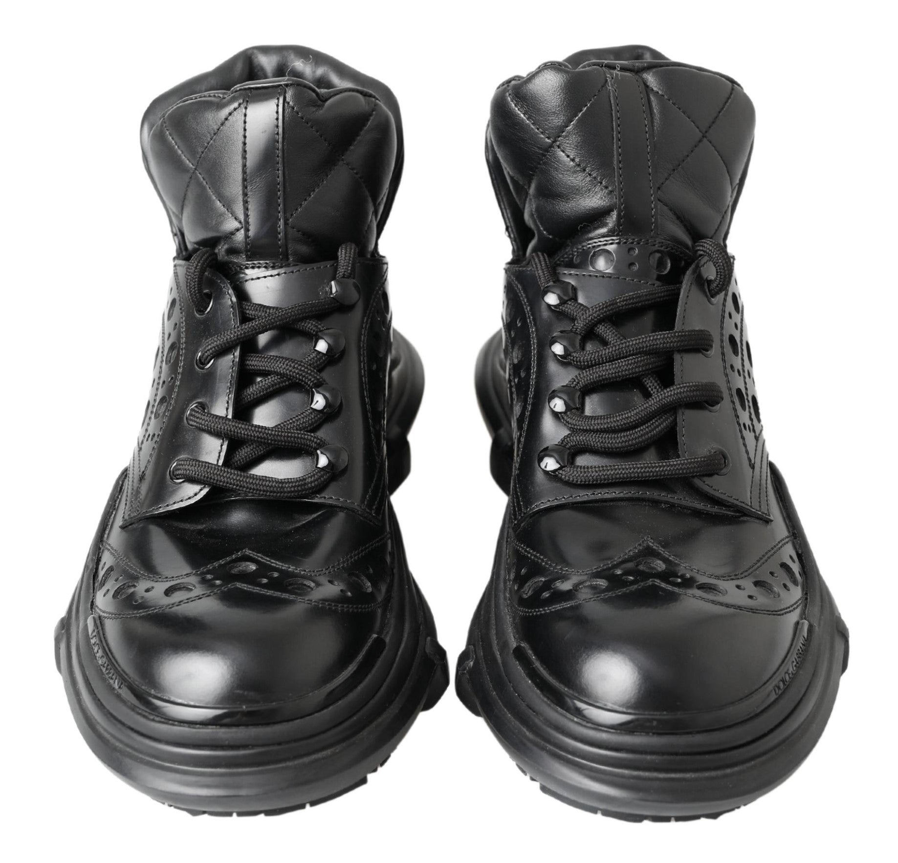 Black leather ankle casual boots by Dolce & Gabbana with sleek design and subtle heel, featuring smooth leather finish.