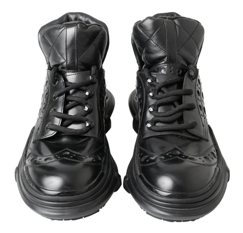 Black leather ankle casual boots by Dolce & Gabbana with sleek design and subtle heel, featuring smooth leather finish.