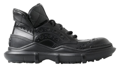 Black leather ankle casual boots by Dolce & Gabbana with sleek design and rounded toes, shown on a plain white background.