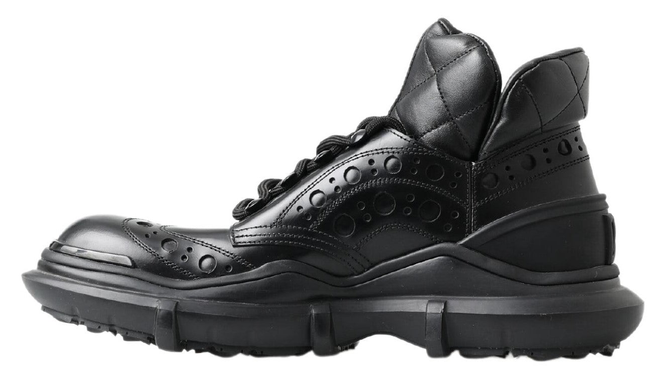 Black leather ankle casual boots by Dolce & Gabbana, featuring a sleek design with lace-up detail and low heel.