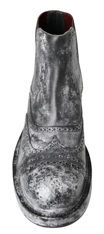 Black and gray leather ankle boots by Dolce & Gabbana featuring sleek design and stylish ankle-height fit.