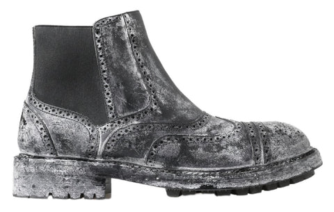 Black and gray leather ankle boots by Dolce & Gabbana with sleek design and stylish ankle-high silhouette.