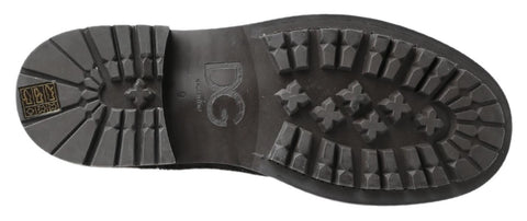 Black and gray leather ankle boots by Dolce & Gabbana featuring sleek design and pointed toes.