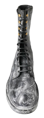 Black and gray leather mid-calf boots by Dolce & Gabbana featuring sleek design and sturdy heel, perfect for stylish winter wear.