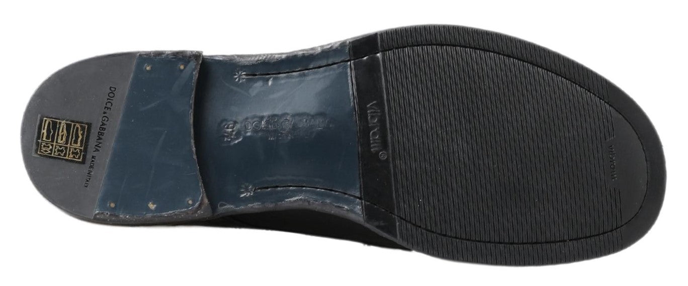 Black Perugino leather boots by Dolce & Gabbana featuring sleek design and ankle height, perfect for stylish everyday wear.