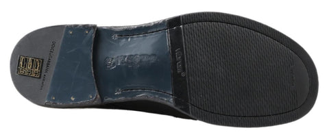 Black Perugino leather boots by Dolce & Gabbana featuring sleek design and ankle height, perfect for stylish everyday wear.