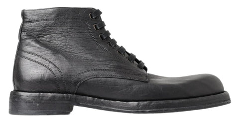 Black Leather Perugino Boots by Dolce & Gabbana, featuring sleek design and classic style, shown from the side view.