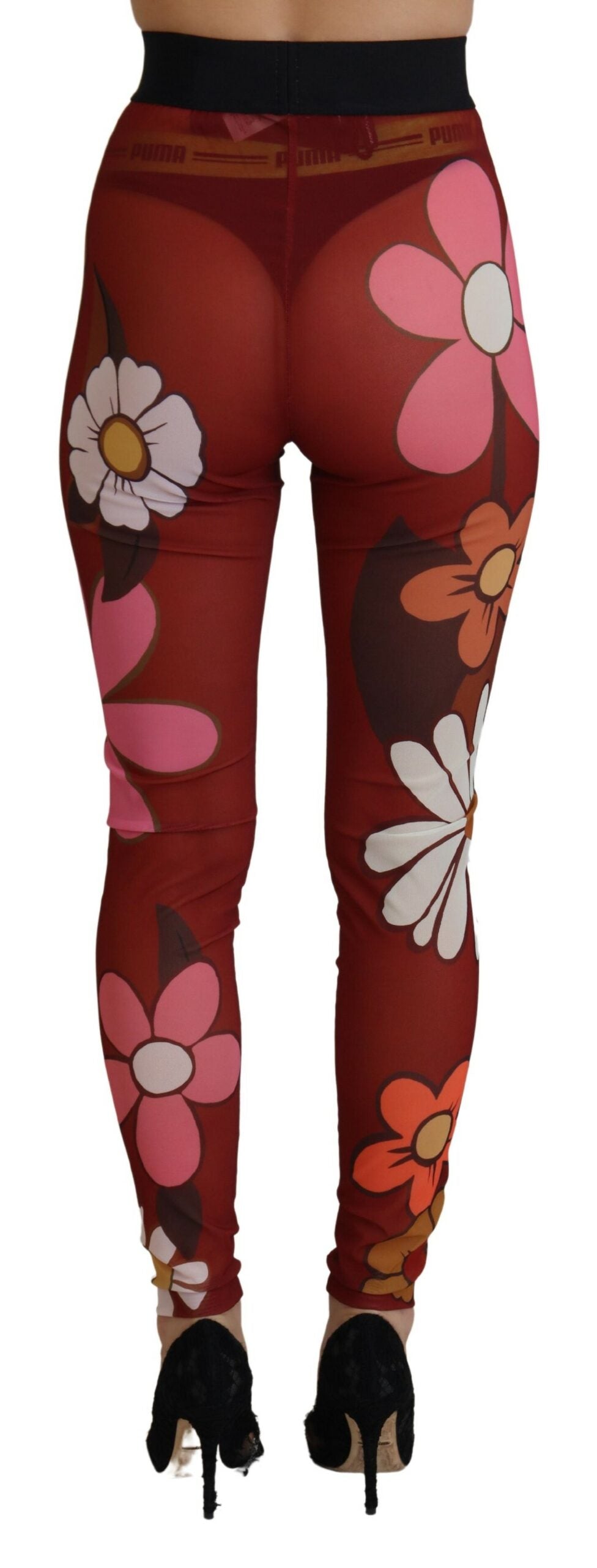 Red floral Dolce & Gabbana leggings with stretchy waist and vibrant floral pattern, designed for comfortable, stylish wear.