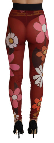 Red floral Dolce & Gabbana leggings with stretchy waist and vibrant floral pattern, designed for comfortable, stylish wear.