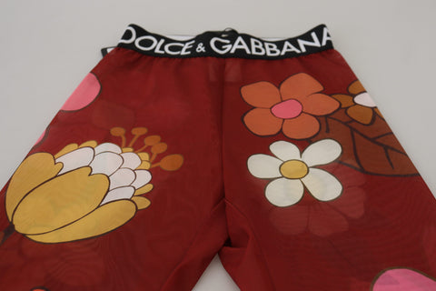 Red floral Dolce & Gabbana leggings with stretchy waist and fitted design, showcasing vibrant floral pattern and comfortable fit.