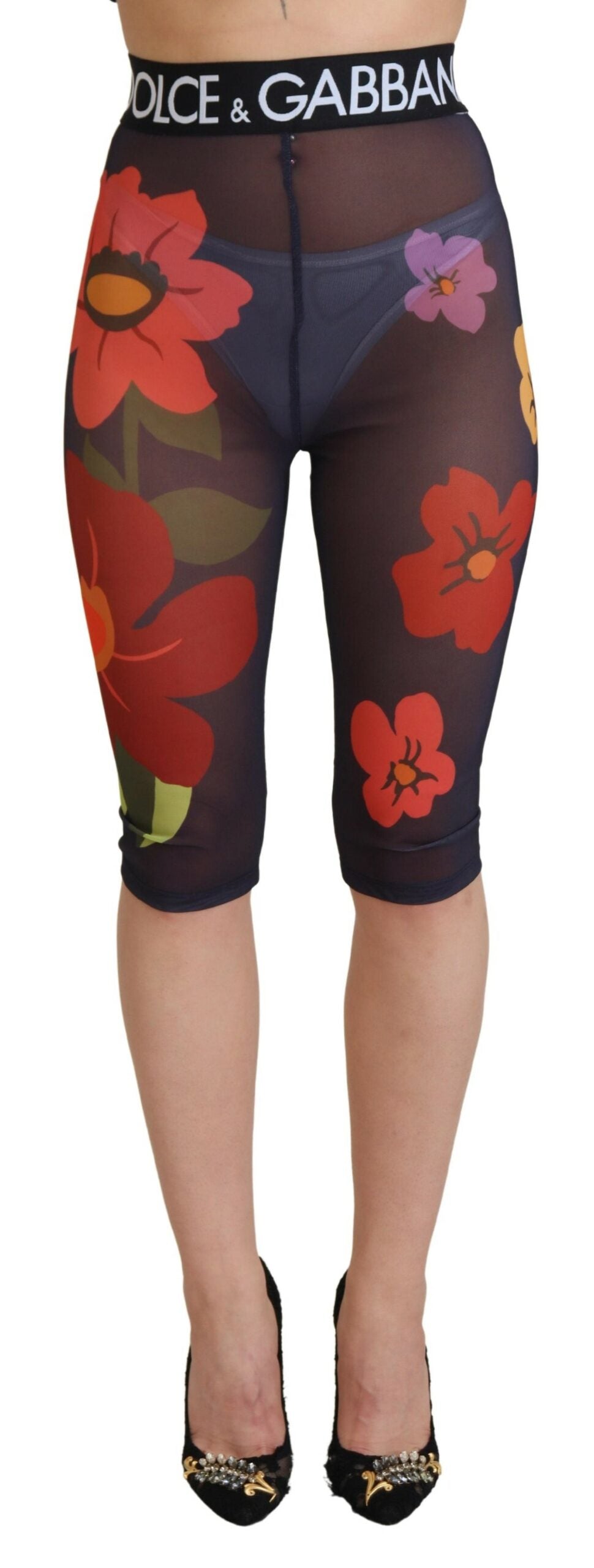 Black floral Dolce & Gabbana leggings with stretch waist and fitted design, showcasing a stylish and comfortable pants style.