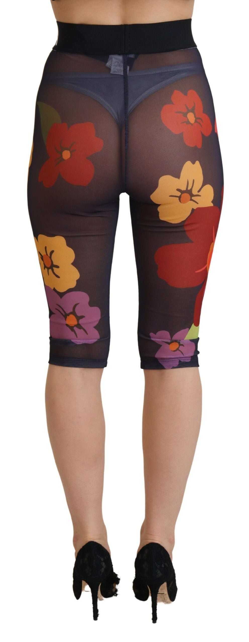 Black floral Dolce & Gabbana leggings with stretch waist and fitted design, featuring vibrant floral pattern and comfortable fabric.