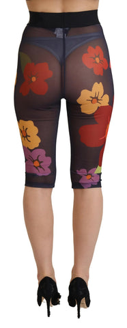 Black floral Dolce & Gabbana leggings with stretch waist and fitted design, featuring vibrant floral pattern and comfortable fabric.