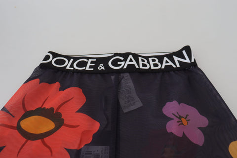 Black floral Dolce & Gabbana leggings with stretchy waist and fitted design, featuring vibrant floral pattern and comfortable fabric.