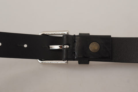 Black calf leather belt by Dolce & Gabbana with silver-tone logo metal buckle, featuring a sleek, stylish design.