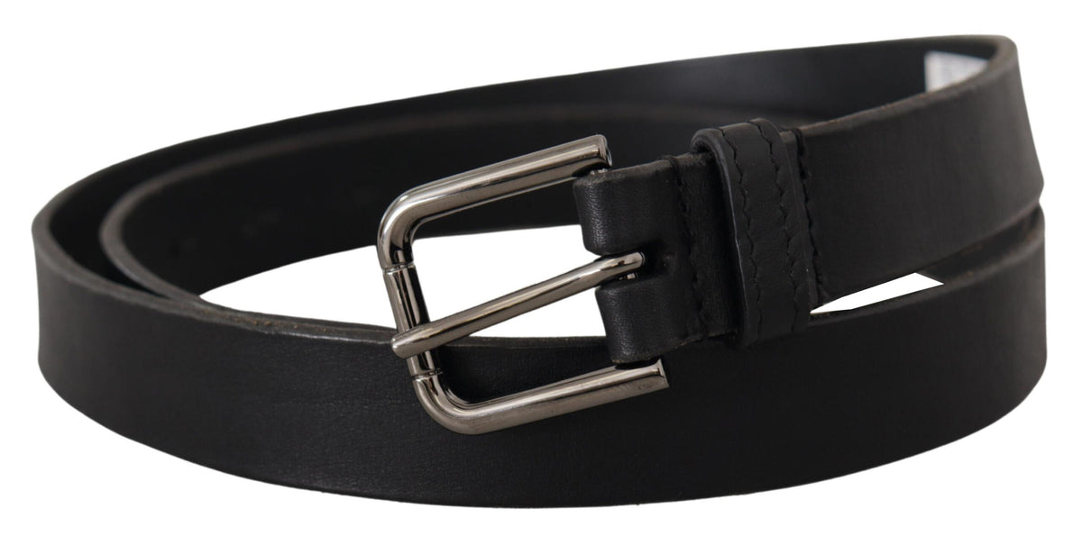 Black calf leather belt with engraved metal buckle and Dolce & Gabbana logo, stylish accessory for men.