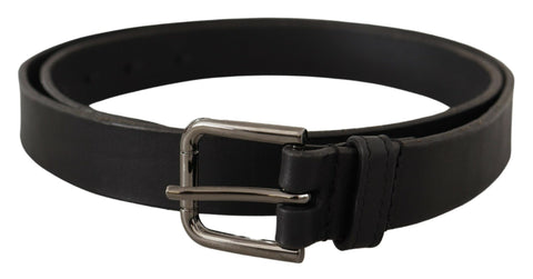 Black calf leather belt with Dolce & Gabbana logo engraved metal buckle, stylish accessory for men.