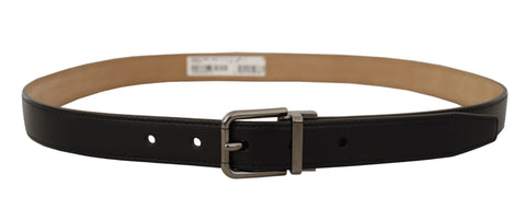 Black calf leather belt with Dolce & Gabbana logo engraved metal buckle, showing detailed leather texture and sleek design.