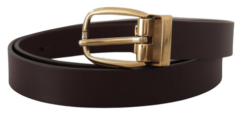 Dark brown calf leather belt with gold-tone metal buckle from Dolce & Gabbana, featuring a sleek and polished design.
