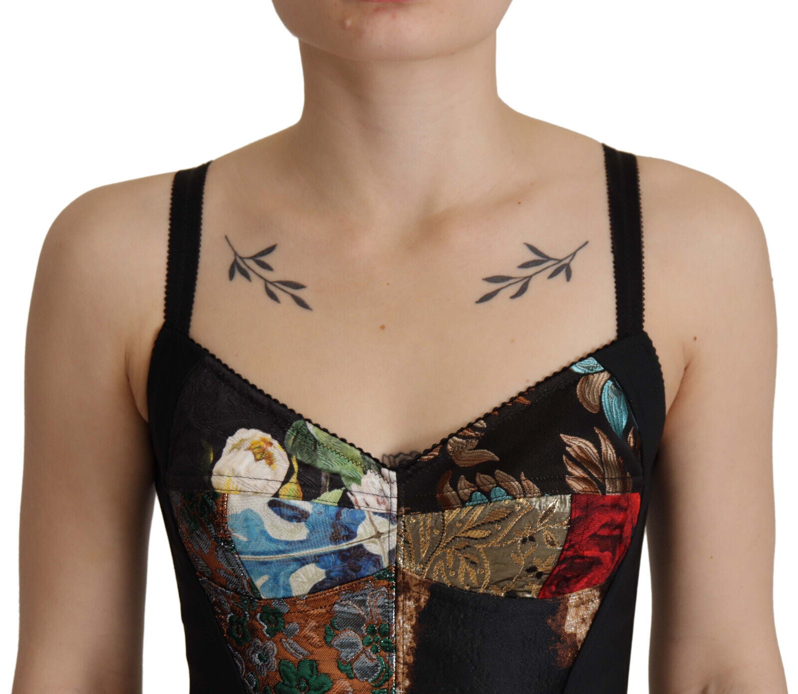 Black patchwork Sicily blouse and corset cropped top by Dolce & Gabbana, featuring intricate design and stylish fabric details.