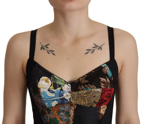 Black patchwork Sicily blouse and corset cropped top by Dolce & Gabbana, featuring intricate design and stylish fabric details.
