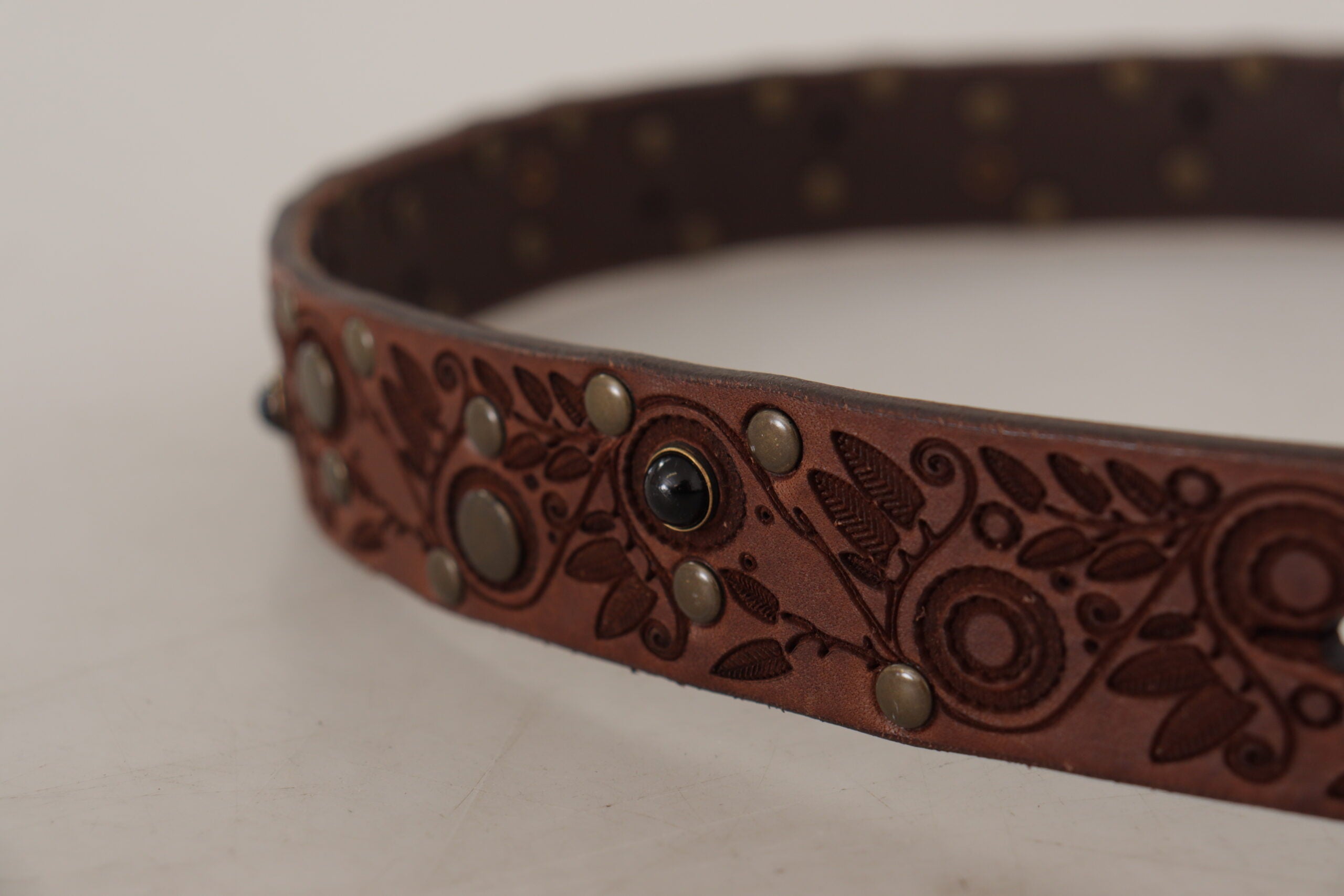 Brown calf leather belt with embossed texture and gold metal buckle from Dolce & Gabbana.