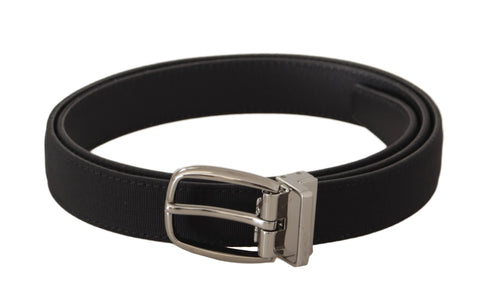 Black calf leather canvas belt by Dolce & Gabbana with silver tone logo metal buckle, stylish accessory for men.