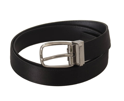 Black calf leather belt with silver logo metal buckle by Dolce & Gabbana, featuring a sleek and stylish design.