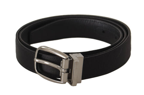 Black calf leather belt with silver logo metal buckle from Dolce & Gabbana, featuring a sleek, stylish design.