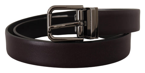 Dark purple leather belt with borchia metal buckle from Dolce & Gabbana, featuring a sleek and stylish design.