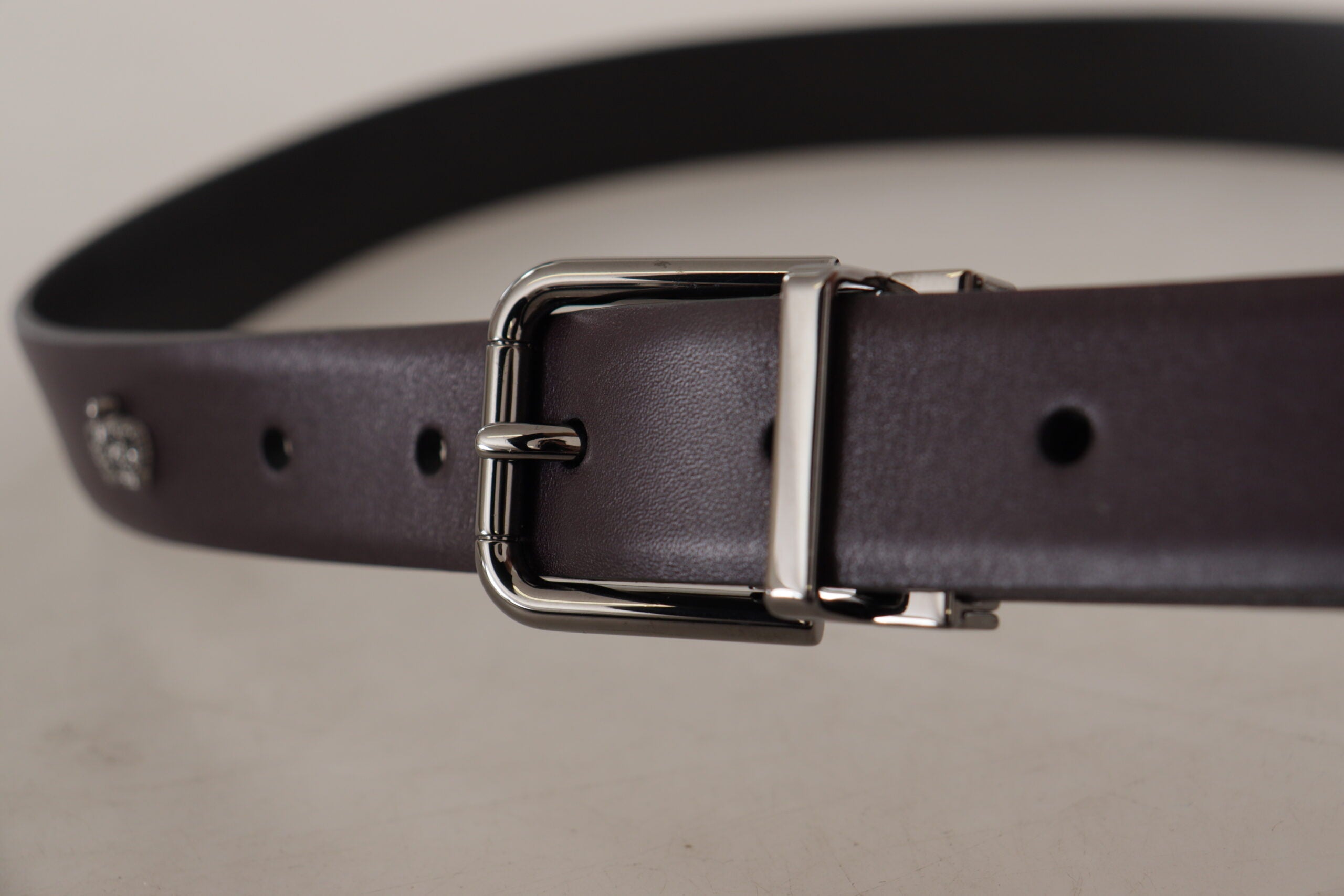 Dark purple leather belt with a metal buckle from Dolce & Gabbana, featuring a sleek, stylish design and high-quality craftsmanship.