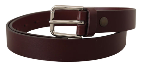 Maroon calf leather belt with silver tone metal buckle from Dolce & Gabbana, showing the detailed buckle design and smooth leather strap.